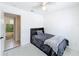 Bright bedroom featuring a bed, and a doorway leading to a connecting room at 1625 Crystal E Ct, Lakeland, FL 33801
