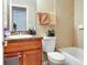 A bathroom with tile and wooden accents at 1016 W 12Th St, Lakeland, FL 33805