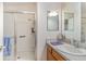 Bathroom features glass-door walk-in shower and a single sink vanity at 1654 Indigo Ave, The Villages, FL 32162