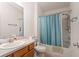 Well-lit bathroom with shower and tub combination at 1654 Indigo Ave, The Villages, FL 32162
