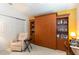 Bedroom featuring a murphy bed and desk at 1654 Indigo Ave, The Villages, FL 32162