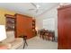 Bedroom featuring a murphy bed and desk at 1654 Indigo Ave, The Villages, FL 32162