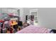 Bright bedroom with a window and playful decor offers a cheerful atmosphere at 828 W 13Th St, Lakeland, FL 33805
