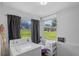 Functional laundry room with natural light and ample space at 828 W 13Th St, Lakeland, FL 33805