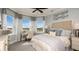 Comfortable bedroom with large windows offering scenic views of the outdoors at 5224 Stone Ridge Pl, St Cloud, FL 34771