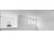 Bright room with natural light showcases a minimalist design with crisp white walls and modern windows at 5224 Stone Ridge Pl, St Cloud, FL 34771