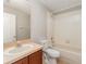 Traditional bathroom with tiled shower and a single sink vanity at 5331 River Rock Rd, Lakeland, FL 33809