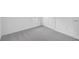 The carpeted bedroom is a blank canvas for new owners to decorate at 1931 Rosewood Cir, Lakeland, FL 33810