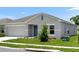 Charming one-story home with well-manicured lawn at 1931 Rosewood Cir, Lakeland, FL 33810