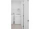 Laundry room featuring a white washer and dryer set at 1931 Rosewood Cir, Lakeland, FL 33810