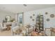 Stylishly decorated living room and dining area featuring modern furnishings and neutral tones at 1931 Rosewood Cir, Lakeland, FL 33810