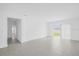 A view of the living room showcasing tile flooring and lots of natural light at 1931 Rosewood Cir, Lakeland, FL 33810