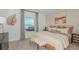 Cozy main bedroom with soft lighting, comfortable bedding, and stylish decor at 1931 Rosewood Cir, Lakeland, FL 33810