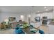 Open-concept living room and kitchen area, creating a perfect space for entertaining and modern living at 4208 Nightcaps Way, Kissimmee, FL 34746