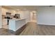 Modern kitchen with stainless steel appliances and a large center island at 1040 Cambridge Drive, Winter Haven, FL 33881