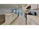 Stylish kitchen with a center island, stainless steel appliances and granite countertops at 1040 Cambridge Drive, Winter Haven, FL 33881