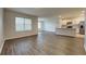 Spacious living room featuring stylish flooring and abundant natural light at 1040 Cambridge Drive, Winter Haven, FL 33881