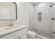 Elegant bathroom featuring modern fixtures, vanity, and a shower at 2216 W Lanier St, Lakeland, FL 33815