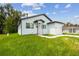 Charming home featuring a modern design, manicured lawn, and inviting curb appeal at 2216 W Lanier St, Lakeland, FL 33815