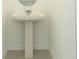 This is a bathroom featuring a pedestal sink at 4532 Ranunculus St, Lake Hamilton, FL 33851