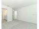 Main bedroom with plush carpeting with ensuite bathroom at 4532 Ranunculus St, Lake Hamilton, FL 33851