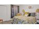 Comfortable bedroom with ample closet space, soft lighting, and a cozy bed, perfect for relaxation at 8825 Latrec Ave # 6308, Orlando, FL 32819