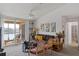 Cozy living room with a large window that brings in natural light and neutral color palette at 8825 Latrec Ave # 6308, Orlando, FL 32819