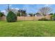 Spacious backyard featuring a privacy wall and a lush green lawn at 139 Sunfish Dr, Winter Haven, FL 33881