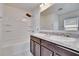 Bathroom with double sinks, a shower-tub combo, and neutral finishes at 139 Sunfish Dr, Winter Haven, FL 33881
