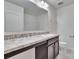 Bathroom showcasing a marble-look countertop with a single sink and a toilet at 139 Sunfish Dr, Winter Haven, FL 33881