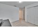 Bedroom featuring carpet floors, a closet, and a door leading to another room at 139 Sunfish Dr, Winter Haven, FL 33881