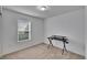 Bedroom with neutral carpet and a window, and a simple desk at 139 Sunfish Dr, Winter Haven, FL 33881