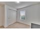 Bedroom with carpet, a closet, and a window at 139 Sunfish Dr, Winter Haven, FL 33881