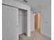 An open closet with wire shelving is conveniently located within the bedroom at 139 Sunfish Dr, Winter Haven, FL 33881