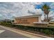 Lake Lucerne community sign with manicured landscaping and cloudy blue sky at 139 Sunfish Dr, Winter Haven, FL 33881
