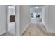 Hallway featuring an open floor plan with views into the bedroom and living room at 139 Sunfish Dr, Winter Haven, FL 33881