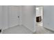 Hallway view showcasing the front door and an adjacent bathroom at 139 Sunfish Dr, Winter Haven, FL 33881