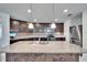 Beautiful kitchen with a large island, stainless steel appliances, and pendant lighting at 139 Sunfish Dr, Winter Haven, FL 33881