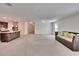 Open-concept living room and kitchen with modern furnishings and plenty of space at 139 Sunfish Dr, Winter Haven, FL 33881