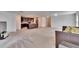 Open-concept living area showcasing a modern kitchen with an island and a spacious seating area at 139 Sunfish Dr, Winter Haven, FL 33881