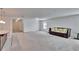 Spacious living room with neutral carpet and a comfortable sofa and lots of natural light at 139 Sunfish Dr, Winter Haven, FL 33881