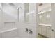 Modern bathroom featuring a walk-in shower with subway tile and built-in bench at 276 Woodsage Pl, Lake Alfred, FL 33850
