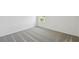 Bright, spacious bedroom with neutral carpet flooring and a large window at 276 Woodsage Pl, Lake Alfred, FL 33850