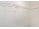 Vacant closet has white walls and wire shelving, offering storage space at 284 Woodsage Pl, Lake Alfred, FL 33850