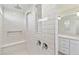 Modern shower featuring tile, bench, niche and rainfall shower head at 284 Woodsage Pl, Lake Alfred, FL 33850