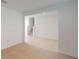 Cozy room showing stairs and light-colored carpet and neutral walls at 5025 Bougainvillea Ct, Lake Hamilton, FL 33851