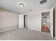 Bedroom features carpet, a ceiling light, closet, interior door, and tan walls at 524 Buckshot Ln, Lakeland, FL 33809