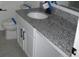 New bathroom featuring a gray granite countertop, modern cabinets, and toilet at 1371 Pompay Dr, Davenport, FL 33896