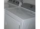 Laundry area featuring a white side-by-side washer and dryer at 1371 Pompay Dr, Davenport, FL 33896