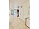 Inviting foyer with tile flooring and a staircase leading to the upper level of the home at 2480 Brownwood Dr, Mulberry, FL 33860